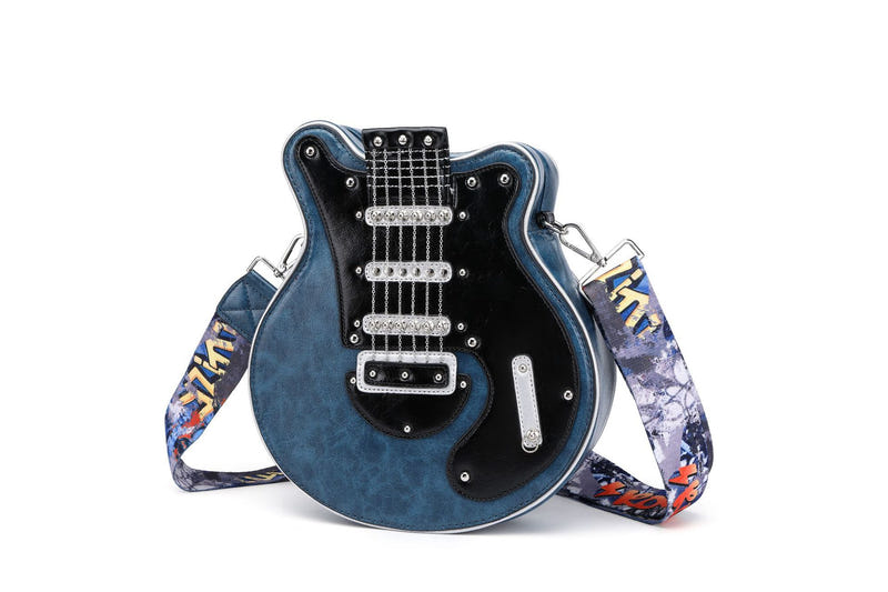 Guitar-shaped crossbody bag with blue front, black detail, and patterned strap
