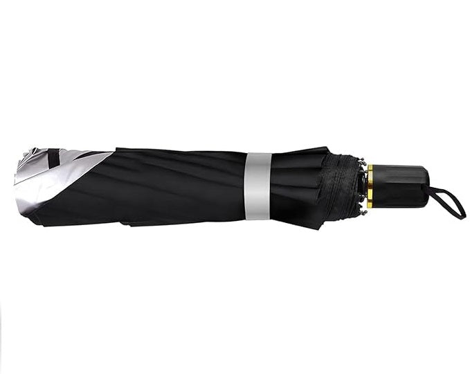 Folded black car windshield sun umbrella with tie strap and gold-toned clasp