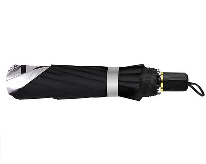 Folded black car windshield sun umbrella with tie strap and gold-toned clasp