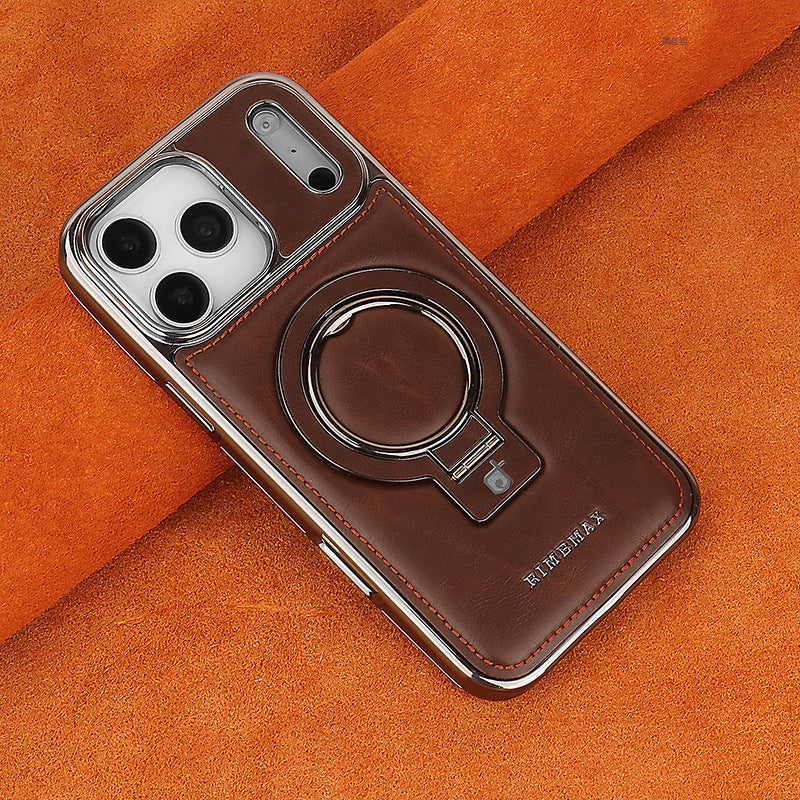 Brown phone case with ring holder on an orange fabric background
