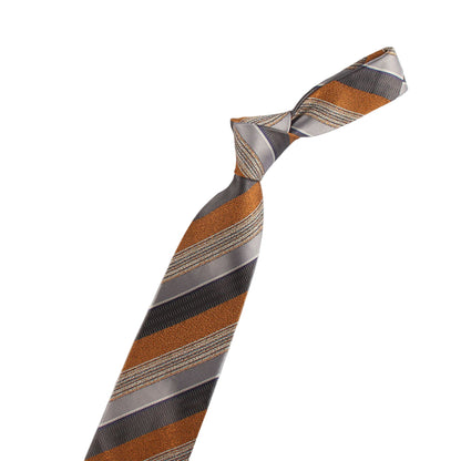 Striped tie with a violin-shaped object on a white background