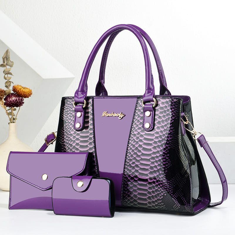 Purple shoulder tote bag with scalloped texture, front pocket, and matching wallet