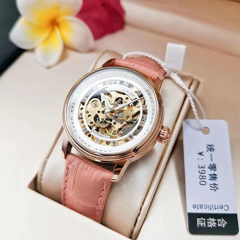 Pink leather mechanical watch with rose-gold case and diamond-accent bezel