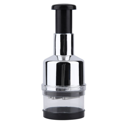Manual press vegetable cutter with a chrome housing, clear cup, and black plunger
