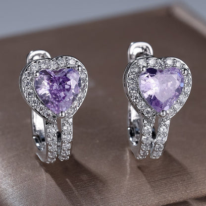 Heart-shaped clip-on earrings with purple gemstones and pavé accents