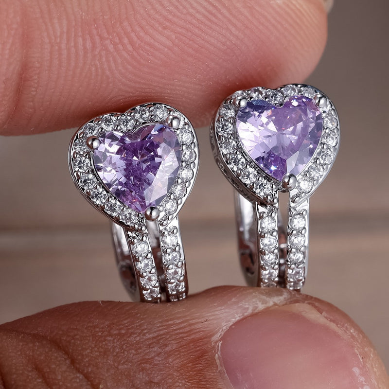 Heart-shaped ear clips with lavender gemstone centers and pavé crystal halos