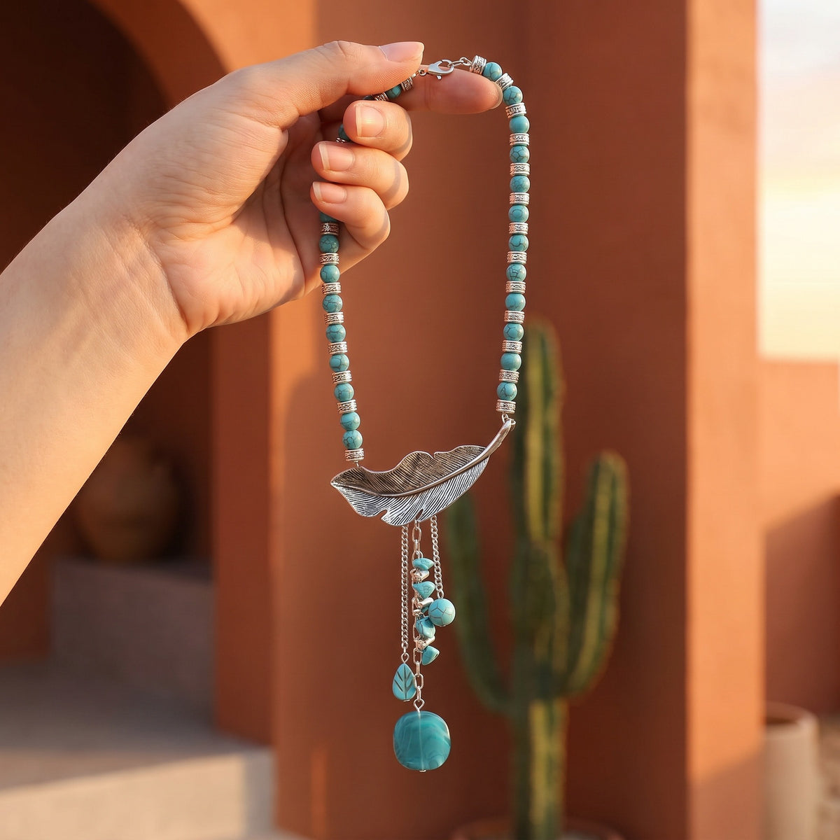 Turquoise bead choker necklace with alloy leaf-feather pendant and long tassel charm