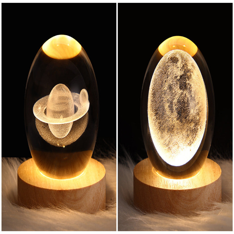 LED crystal ball night lamp with wooden base and glowing space planet motif