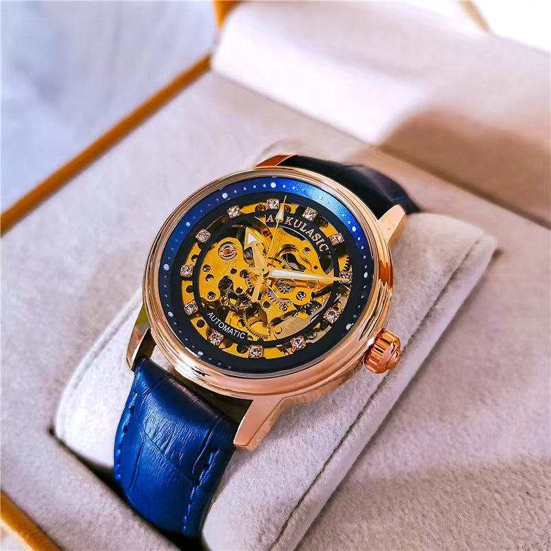 Blue leather mechanical watch with rose-gold case and diamond-accent bezel