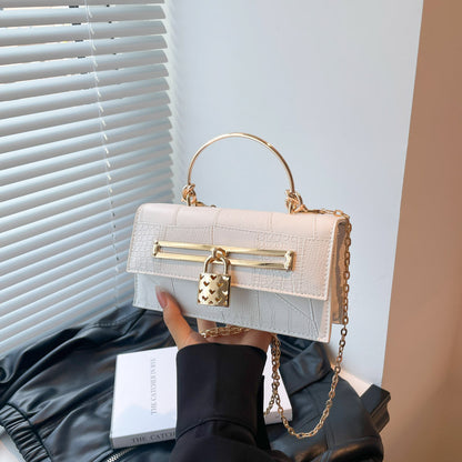 Women’s chain crossbody bag in white PU leather with gold-tone hardware and lock charm
