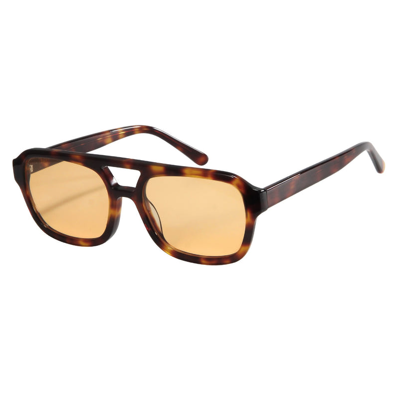 Tortoiseshell cat-eye sunglasses with amber tinted lenses and curved top frame
