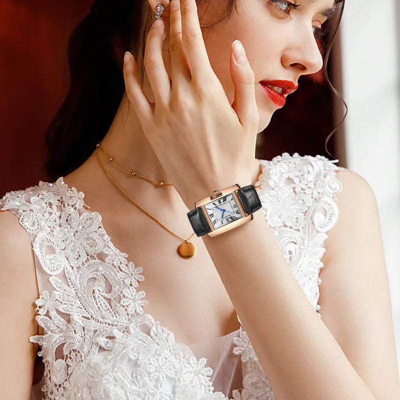 Women’s rectangular quartz watch with black leather strap and rose gold-toned case