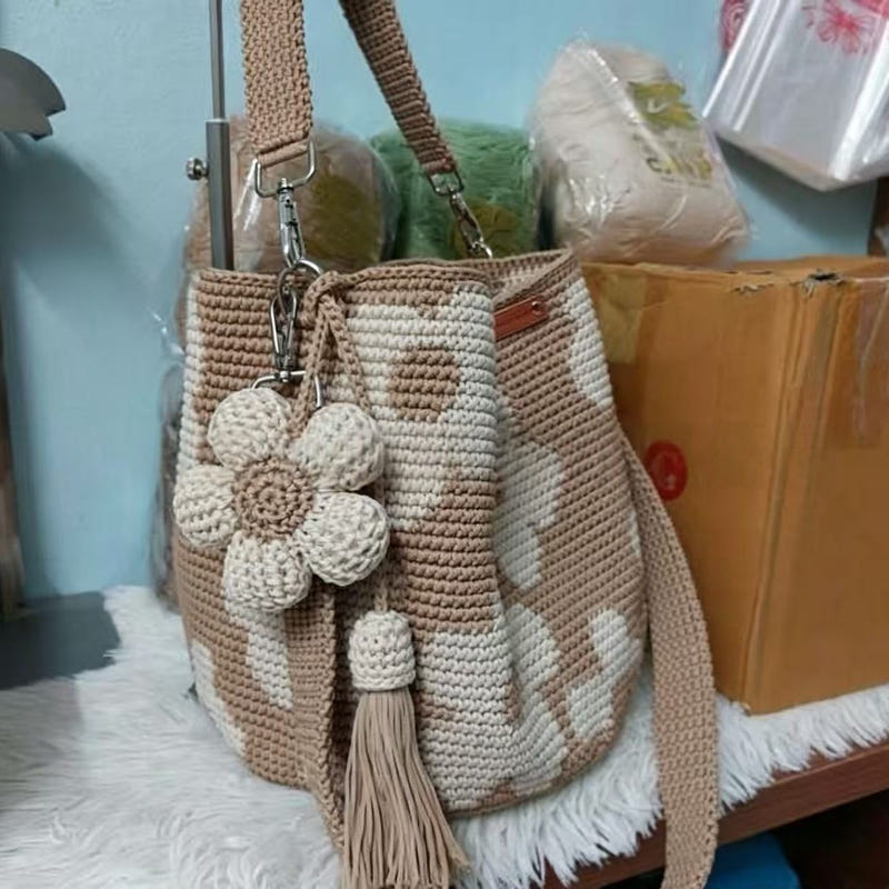 Hand-crocheted flower tote bag in beige with white crocheted flowers and tassel