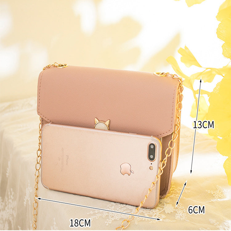 Light pink small square crossbody bag with gold cat clasp and chain strap, 18x13x6cm