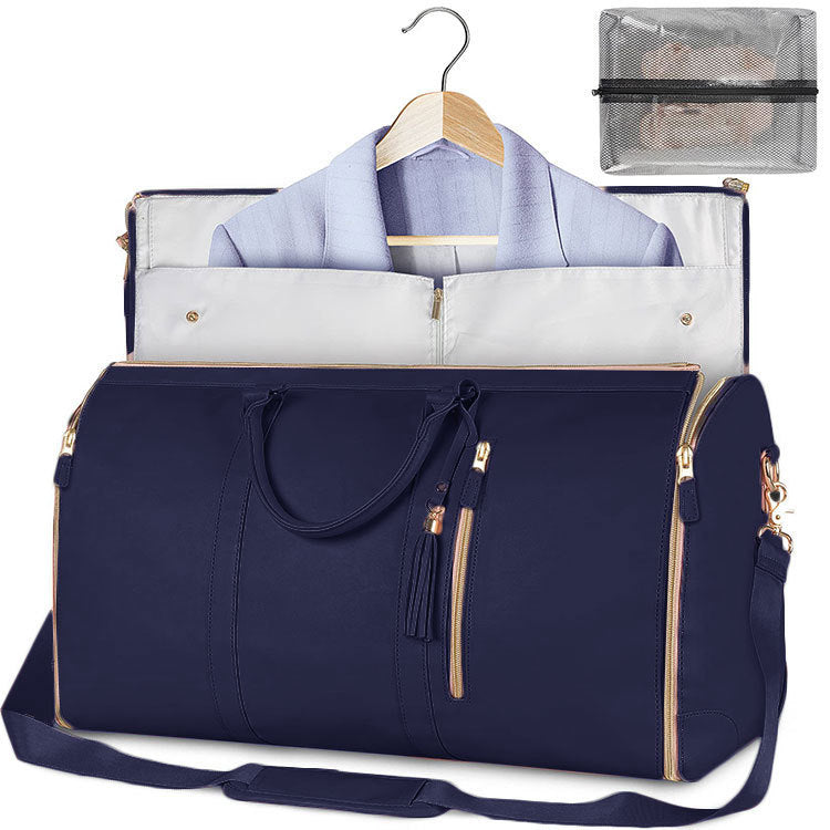 Navy travel duffel bag with front zipper pocket and shoulder strap