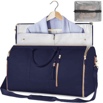 Navy travel duffel bag with front zipper pocket and shoulder strap