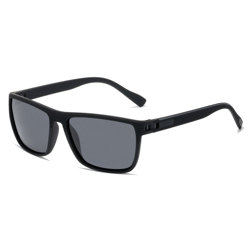 Polarized UV400 driving sunglasses, black PC frame with dark gray lenses, side profile