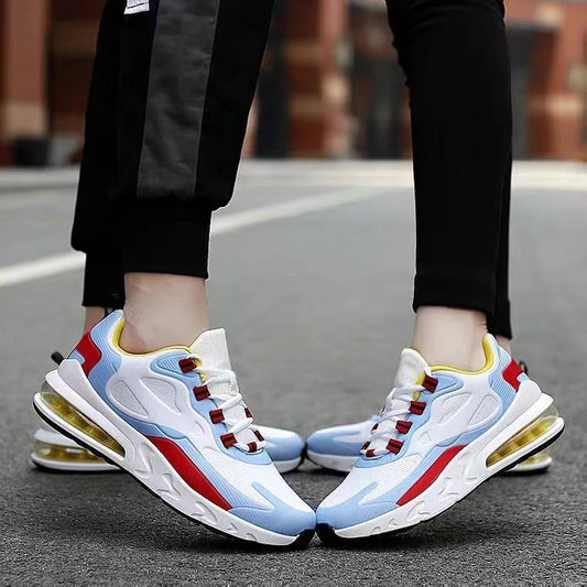 Colorful sneakers worn on a street with blurred background