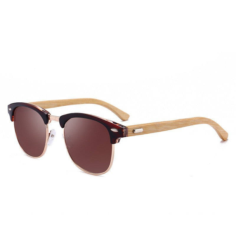 Sunglasses with wooden frame and brown lenses on a white background