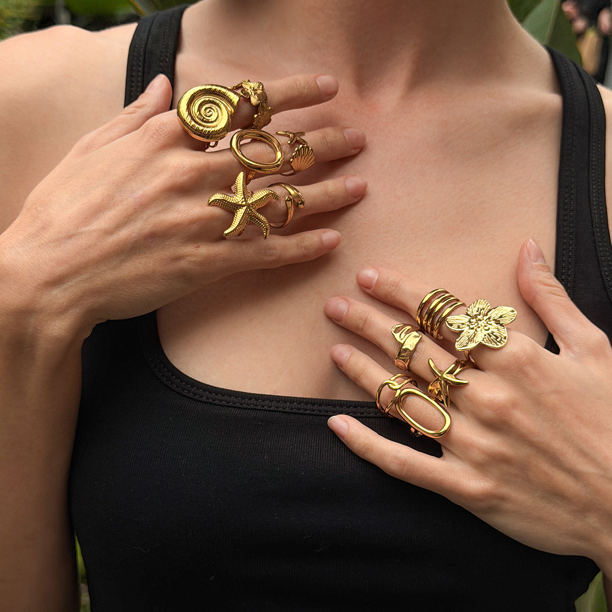 Gold 18K vacuum-plated spiral ring with coiled ridges on an open band