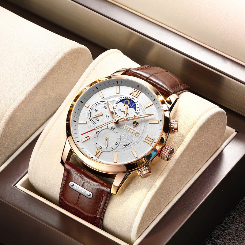 Rose gold chronograph quartz watch with white dial and brown leather strap