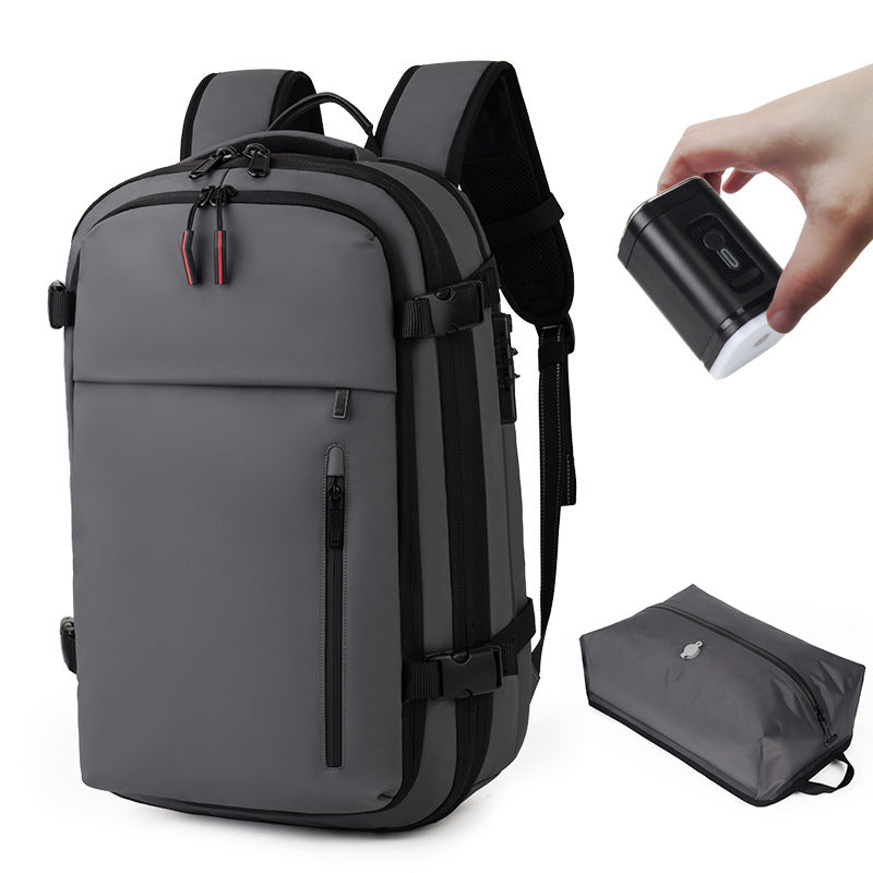 Gray travel backpack with front zipper pocket, air pump pouch, and adjustable straps