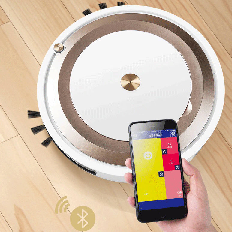 Gold and white smart robot vacuum with app control smartphone on foreground
