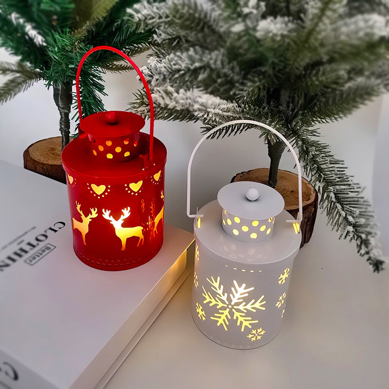 Red and white LED Christmas lantern candles with tree and snowflake cutouts