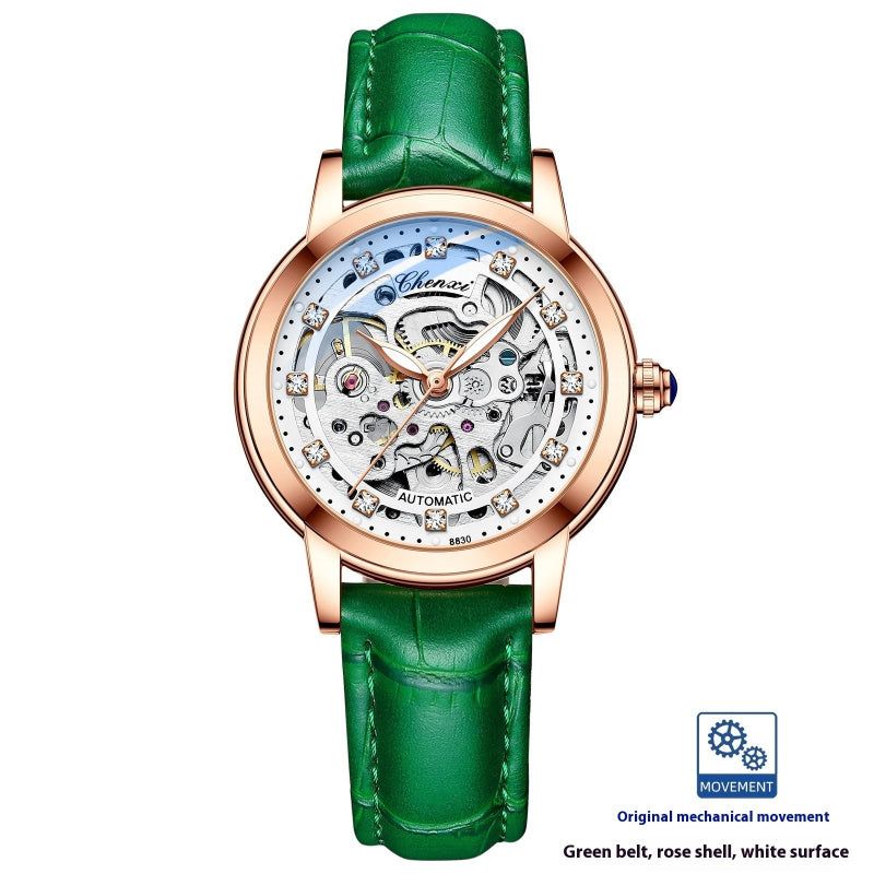 Rose gold skeleton mechanical watch with glossy green leather strap and open dial