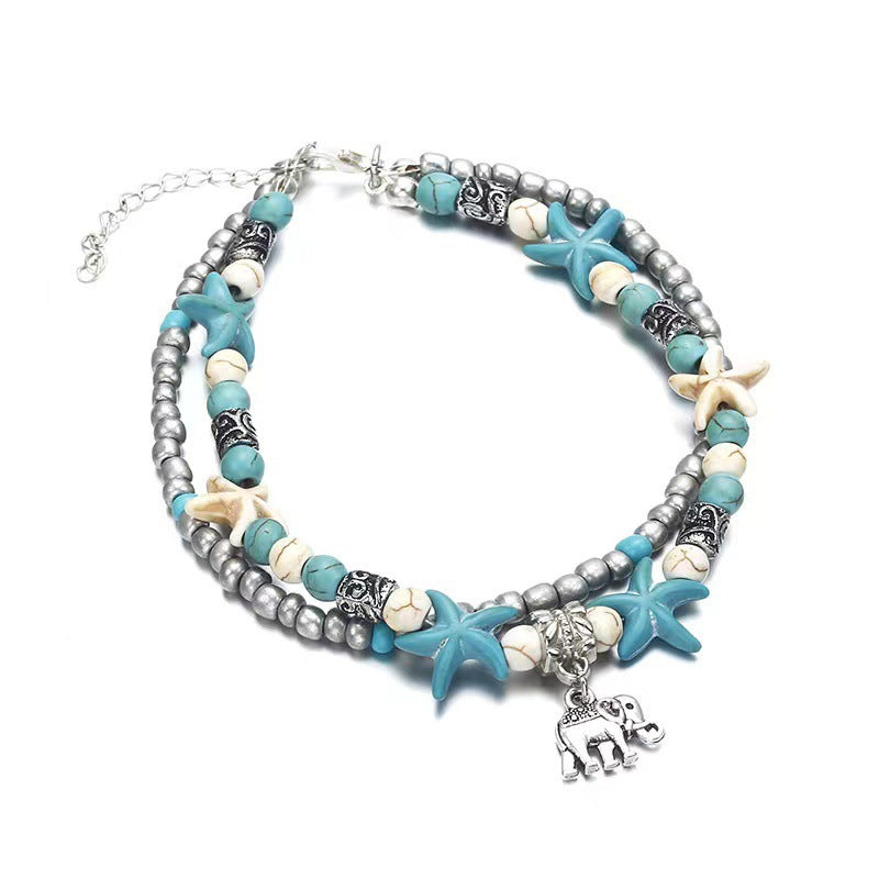 Turquoise and silver beaded anklet with starfish charms and elephant charm pendant
