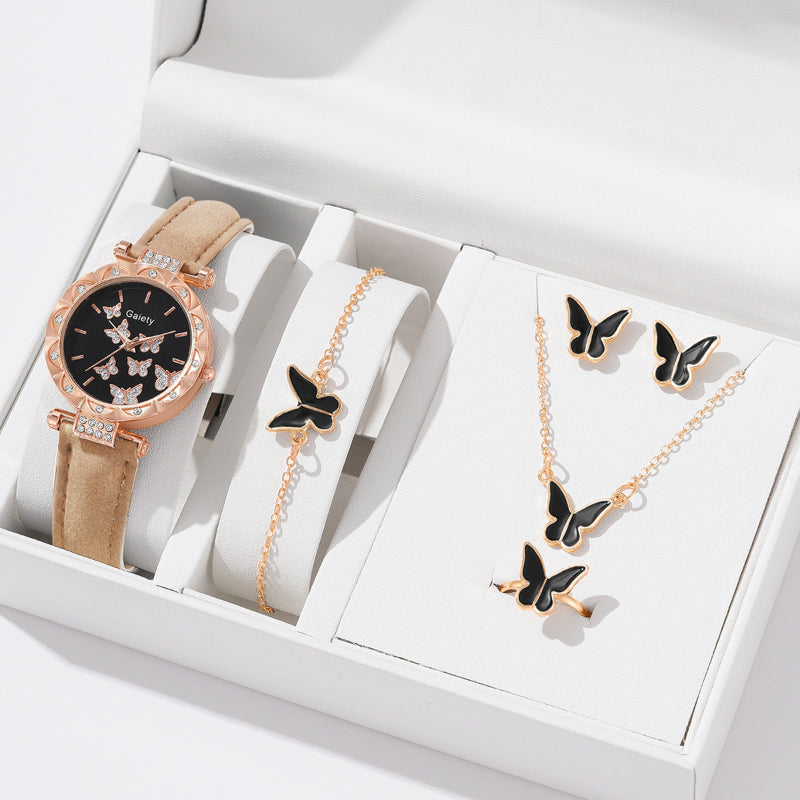 Rose-gold butterfly quartz watch with beige leather strap, jeweled bezel and butterfly dial