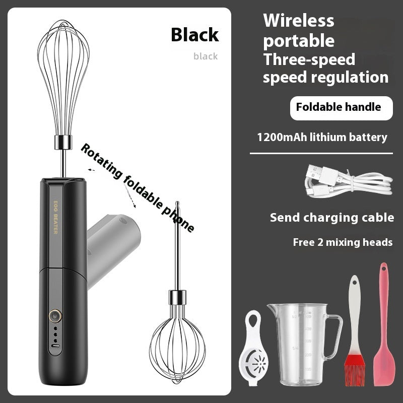 Wireless electric egg beater in black with foldable handle and wire whisk beaters