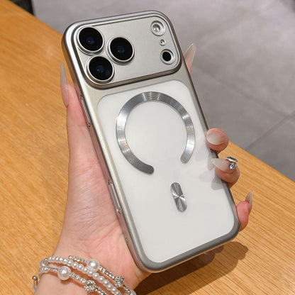 Hand holding a phone case with Apple AirTag holder on a wooden surface