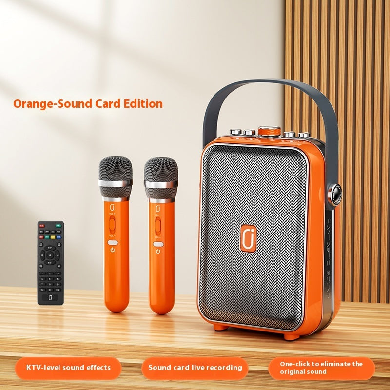 Orange karaoke Bluetooth speaker with two matching handheld microphones