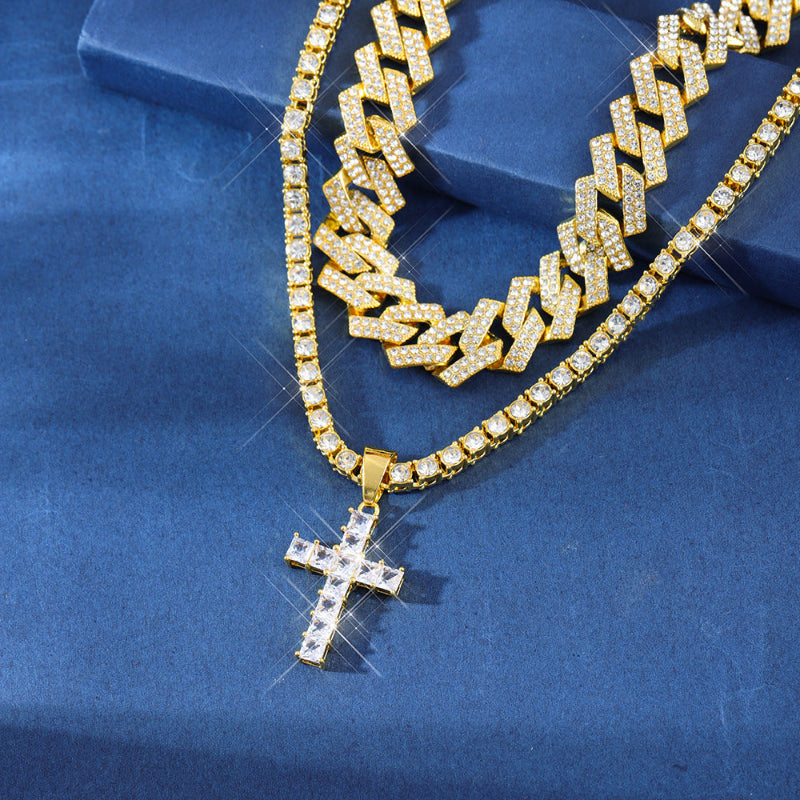 Gold necklace with a cross pendant on a blue background