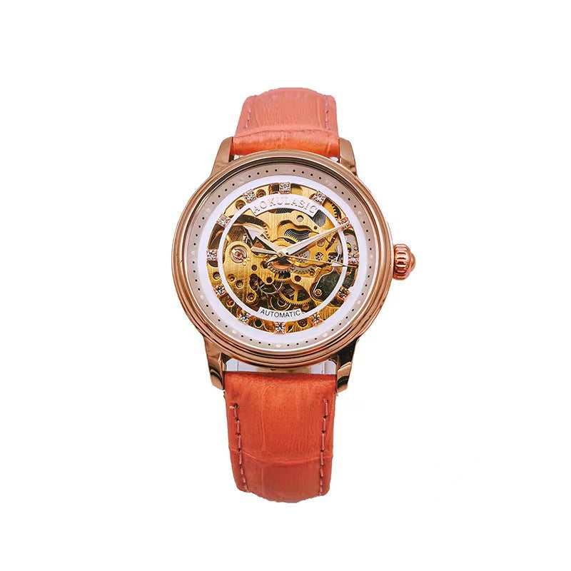 Orange leather-strap mechanical watch with rose-gold case and diamond-accent bezel