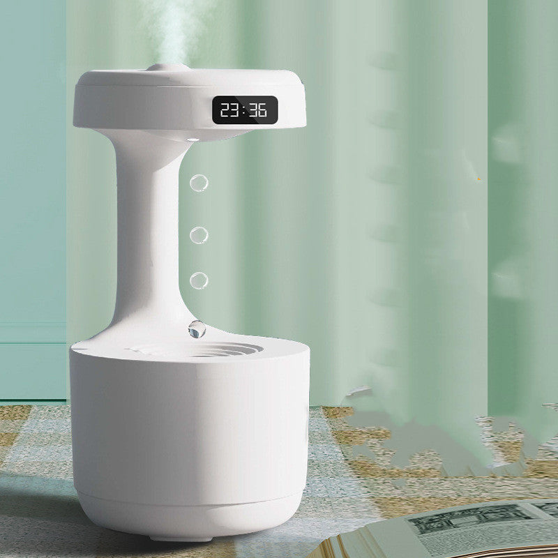 White anti-gravity humidifier with digital LED clock on top and mist outlet