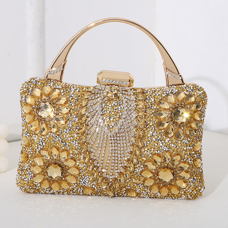 Handmade diamond clutch bag in gold with crystal flower pattern and gold-tone handle