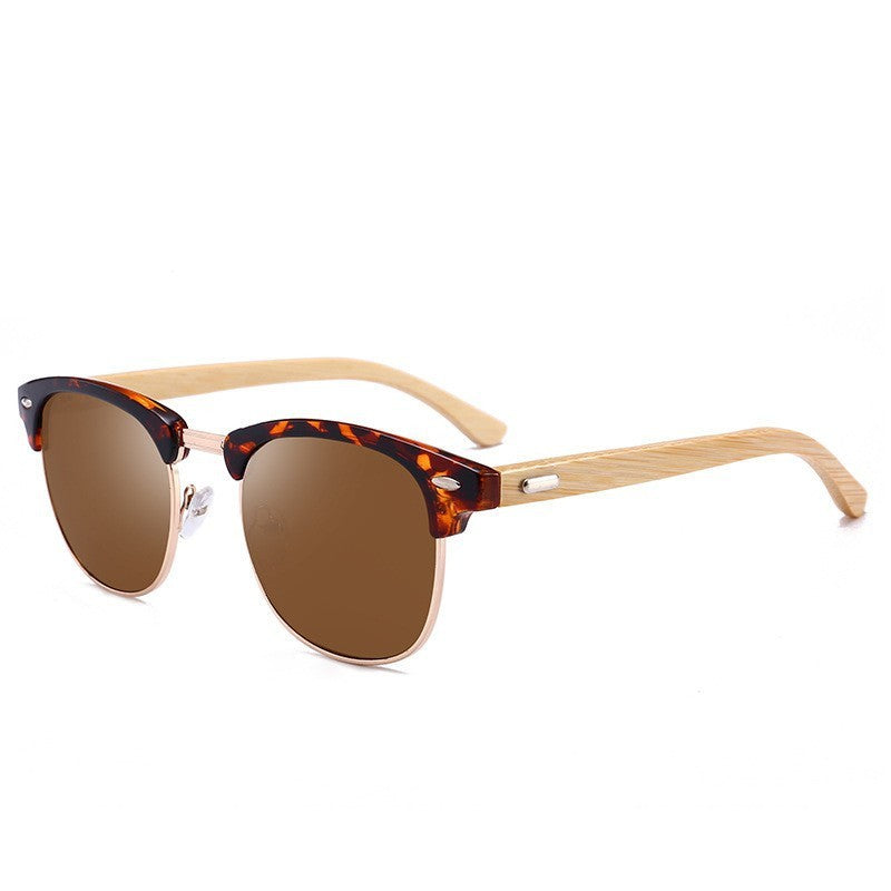 Sunglasses with tortoiseshell frame and brown lenses on a white background