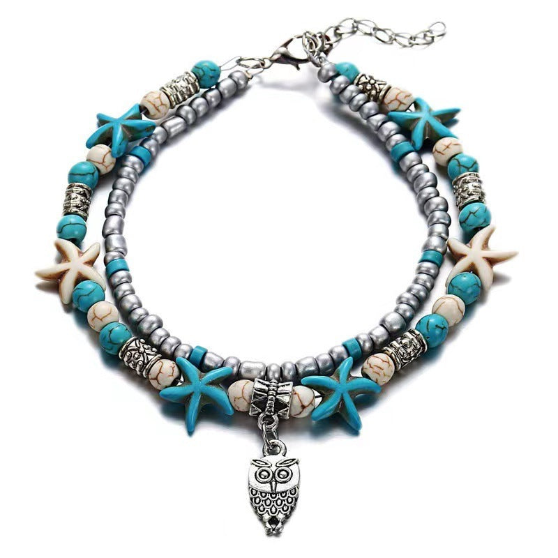 Turquoise and silver beaded anklet with starfish accents and owl-shaped pendant