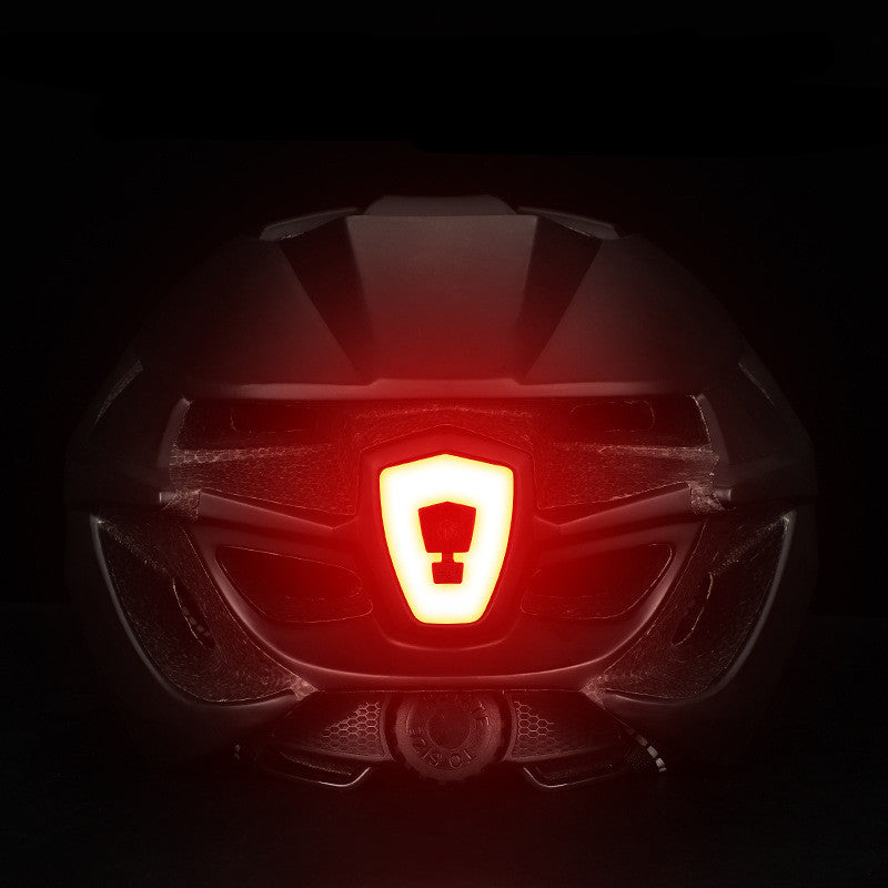 Cycling helmet with integrated goggles, front red LED light