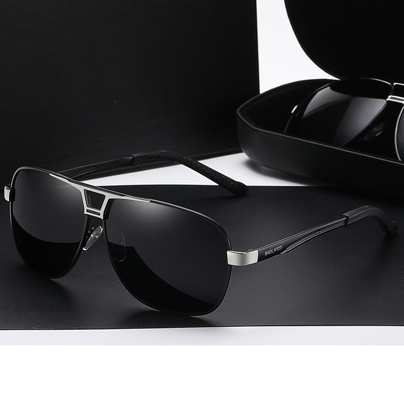 Polarized sunglasses with dark lenses and silver frame, side logo visible