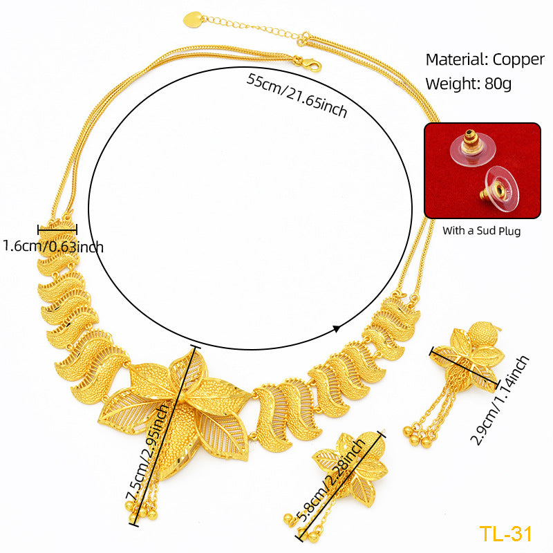 Gold necklace with measurements and material details on a white background