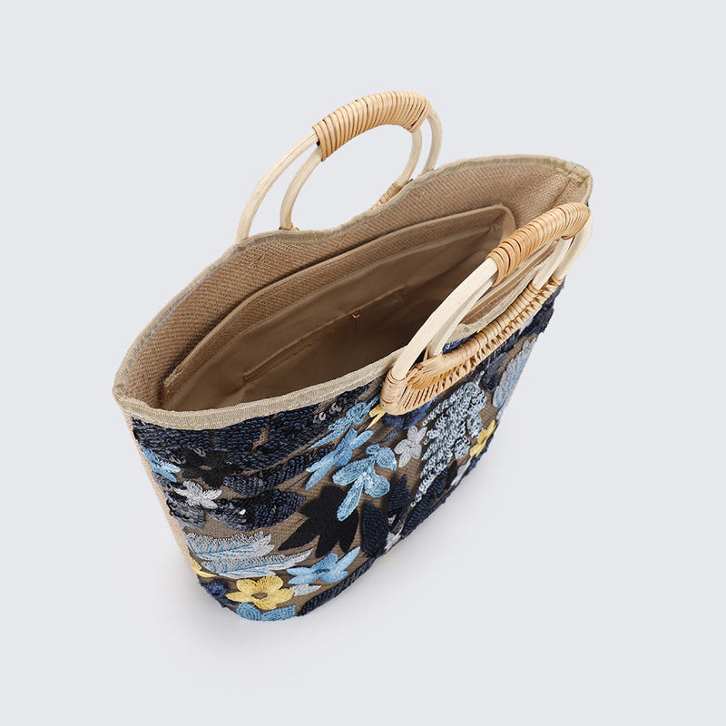Large woven cotton tote bag with blue sequined florals and beige lined interior