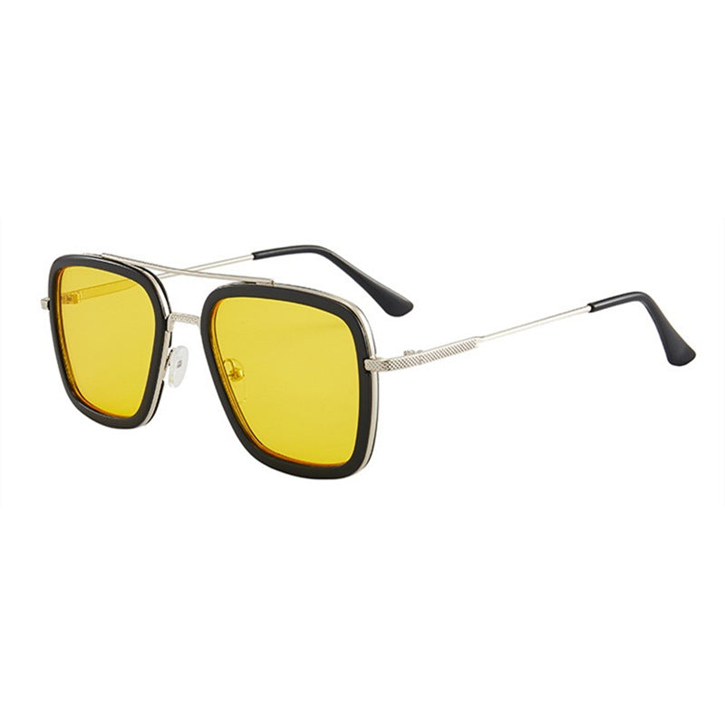 Square frame sunglasses with black frame, gold accents, and yellow lenses
