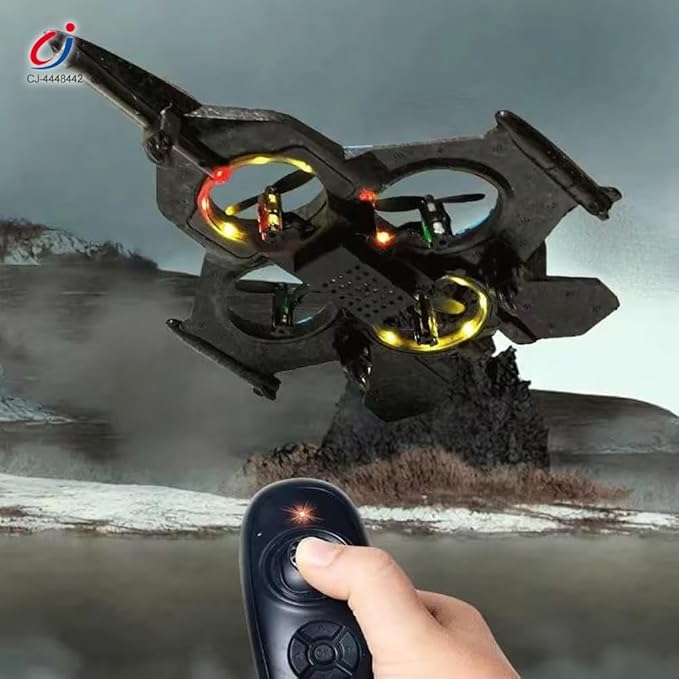 Black fighter jet toy with glowing yellow lights and a hand holding the remote controller
