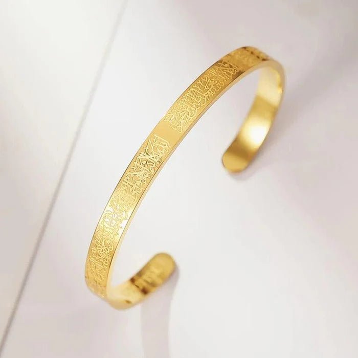 Gold-tone engraved bangle with Islamic calligraphy band, open cuff
