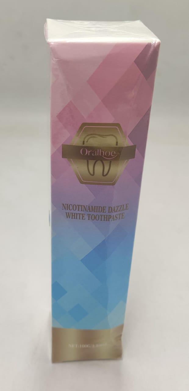 Nicotinamide toothpaste in a pink and blue gradient tube