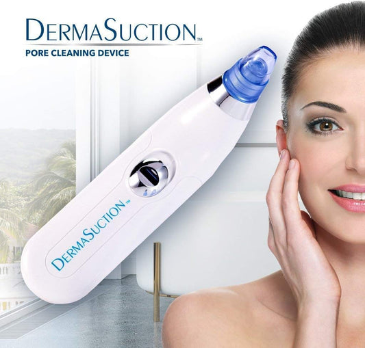 Pore cleaning device with blue suction nozzle on white handheld body