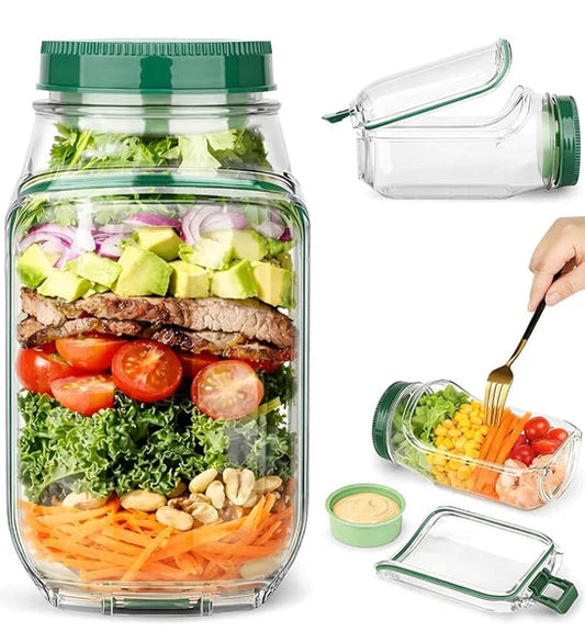 Portable salad container jar with green lid and clear glass body, sealed